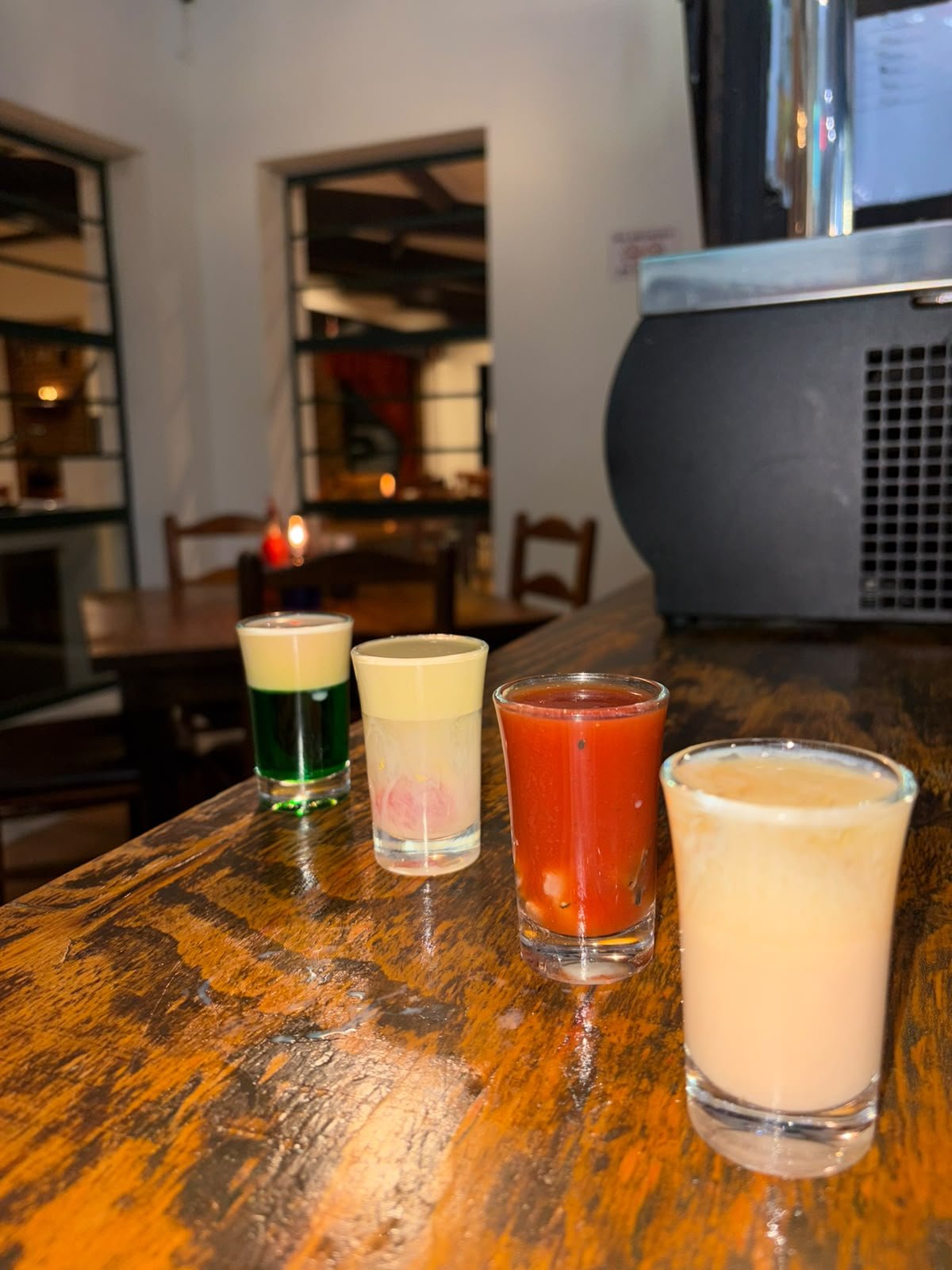 A lineup of house-made shooters, including the Springbok and Oyster Shooter, at Gavin's Trattoria