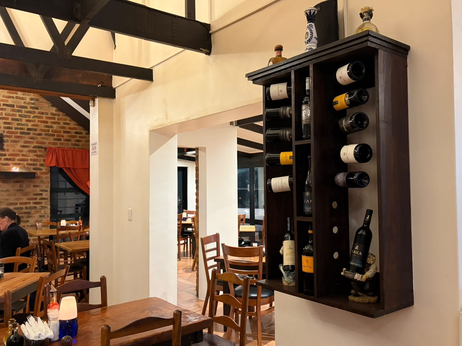 Handmade wine rack holding the trattoria's wine selection
